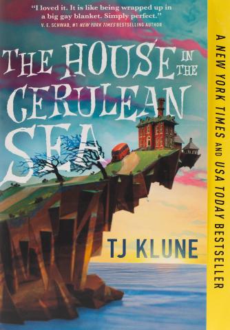 Book cover for The House in the Cerulean Sea, featuring a small house on a cliff edge over an ocean at sunset