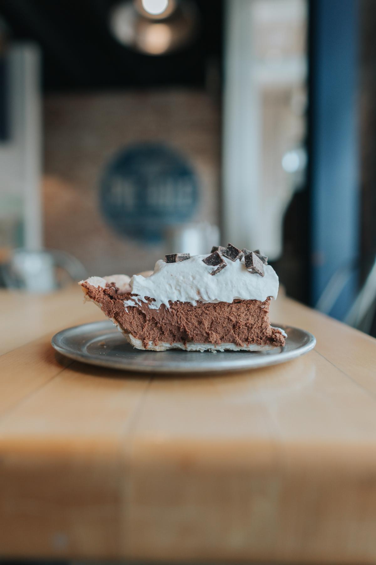 A slice of chocolate cream pie