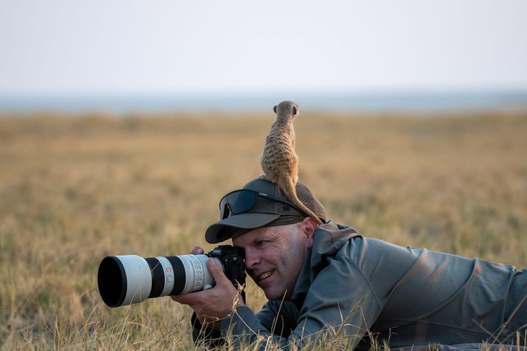 Image of Artist with Meerkat